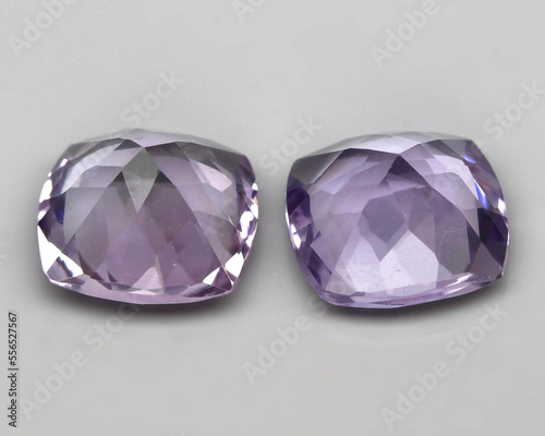 Natural stone purple amethyst on a gray background
