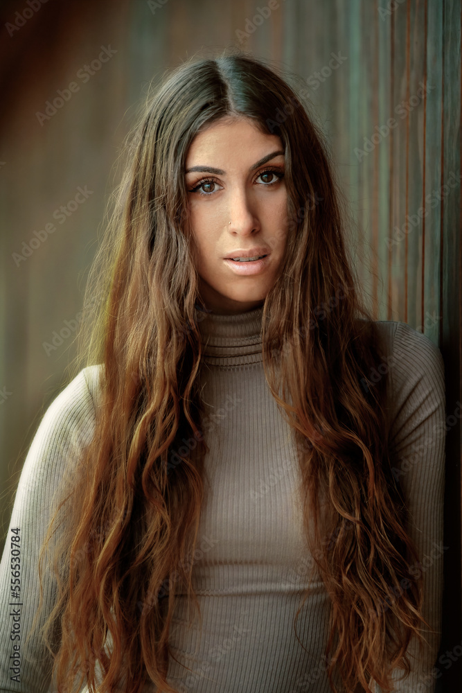 beautiful long-haired woman looking straight into your eyes beautiful long-haired woman looking straight into your eyes