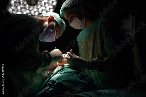 rhinoplasty surgery, defects in the shape of the nose in the female patient. Surgical intervention in plastic surgery rhinoplasty 