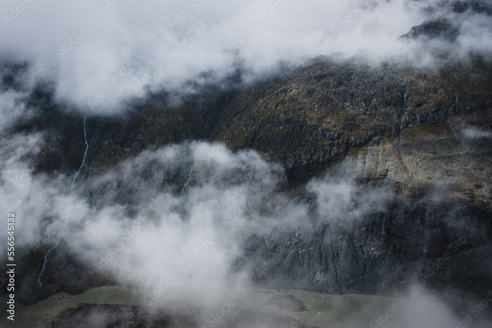 A view of the Austrian Alps on the Grossglockner. Foggy day in the mountains. Shot of beautiful steep rocks.