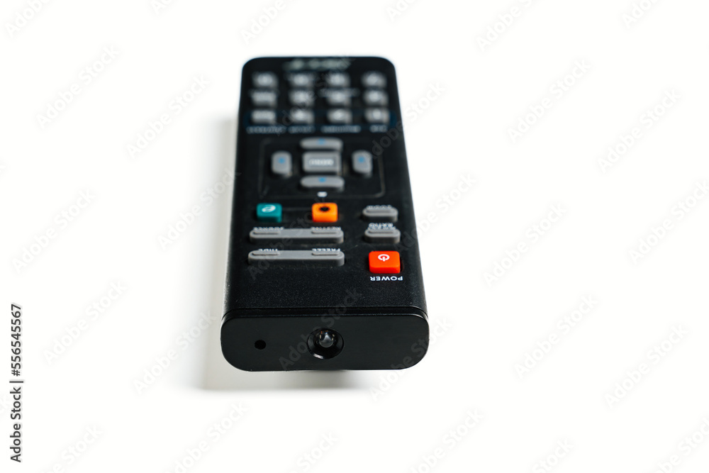 black remote control for home video projector on a white background. 