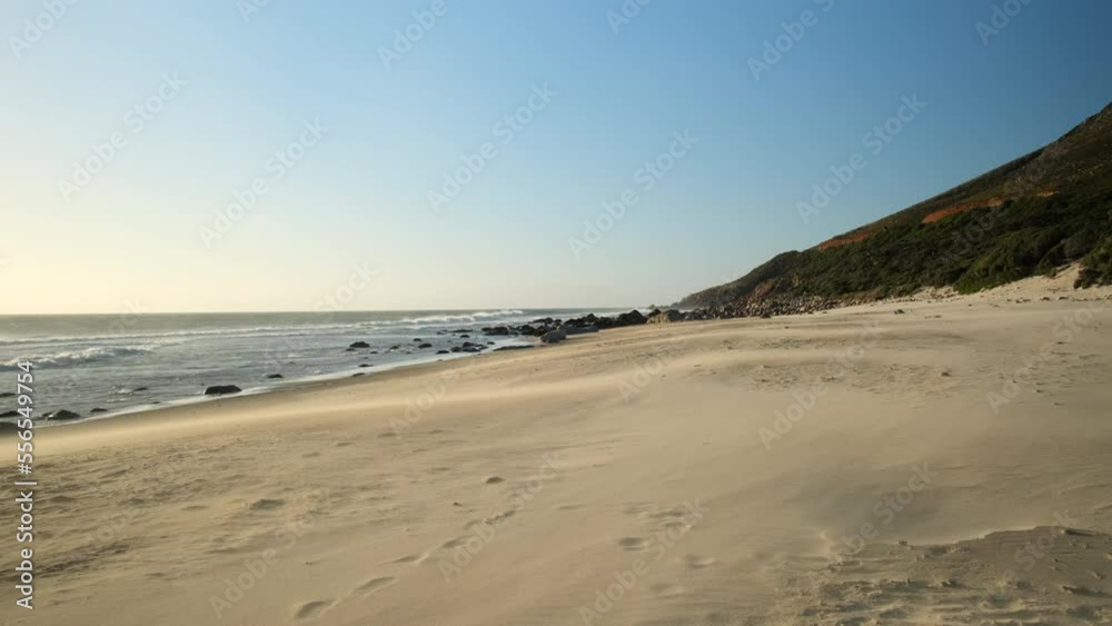 White Sandy Beach and Beautiful Blue Ocean. Amazing Sunrise Over Tropical Landscape. Hawaiian Island Coastline. Beautiful tropical beach and rocky coastline and beautiful forest White Sandy Beach and Beautiful Blue Ocean. Amazing Sunrise Over Tropical Landscape. Hawaiian Island Coastline. Beautiful tropical beach and rocky coastline and beautiful forest