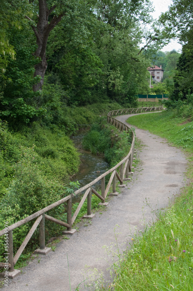 Walking path from Oviedo to Las Caldas. Wooden fence, no people Walking path from Oviedo to Las Caldas. Wooden fence, no people