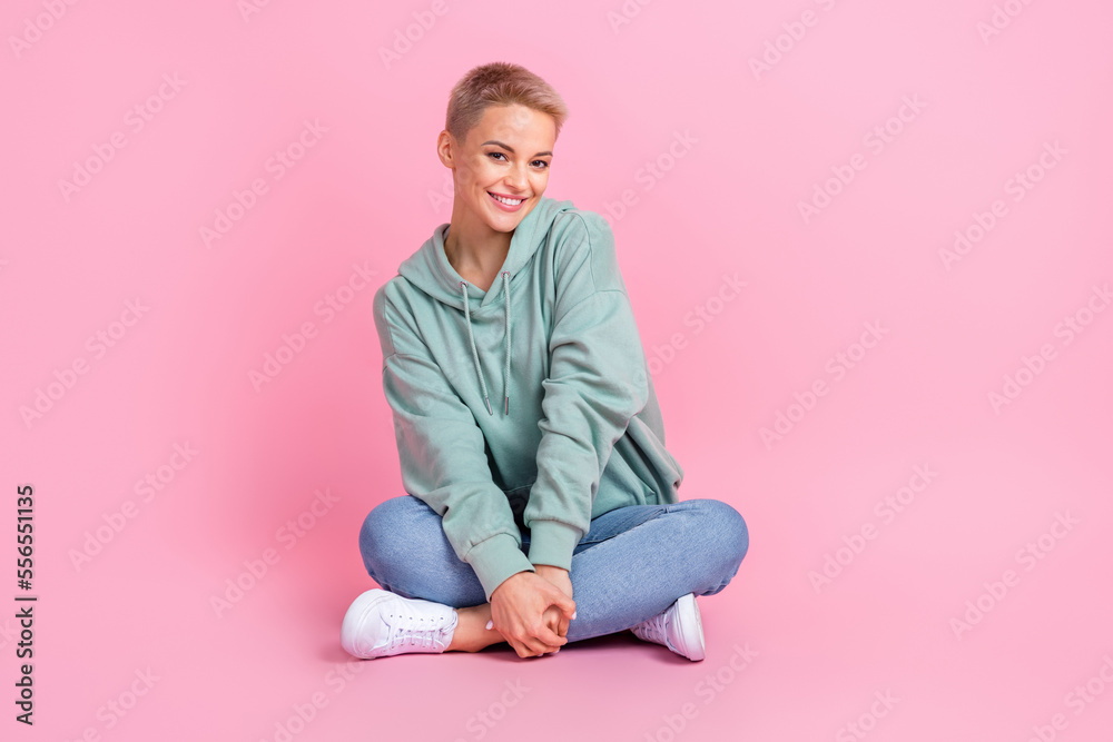 Full length photo of cheerful pretty lady wear comfort clothes enjoy free time good mood isolated on pink color background Full length photo of cheerful pretty lady wear comfort clothes enjoy free time good mood isolated on pink color background