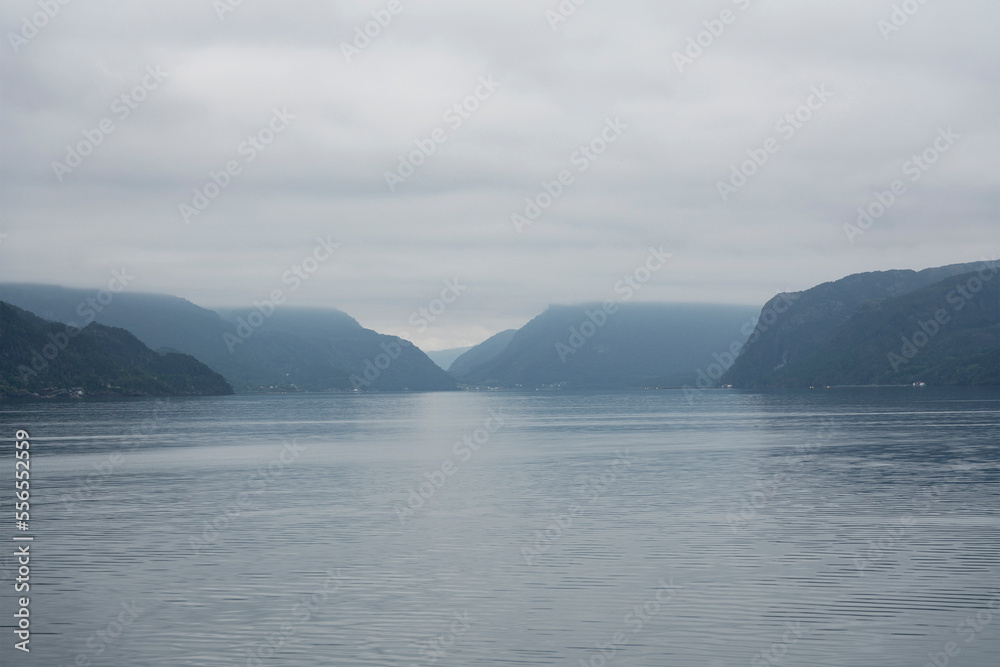 Mountain fjord sea foggy landscape view, Norway