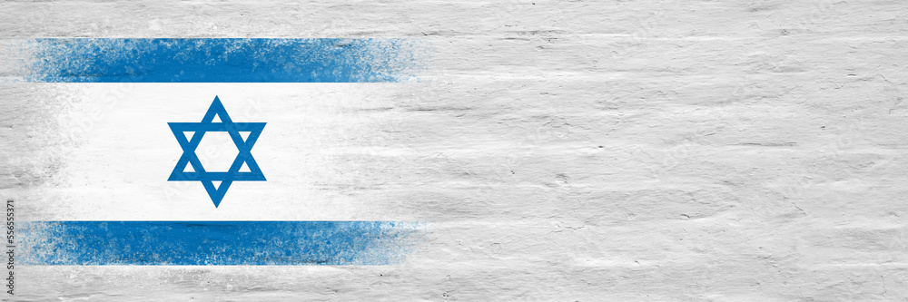 Flag of Israel. Flag painted on a white plastered brick wall. Brick background. Copy space. Textured background