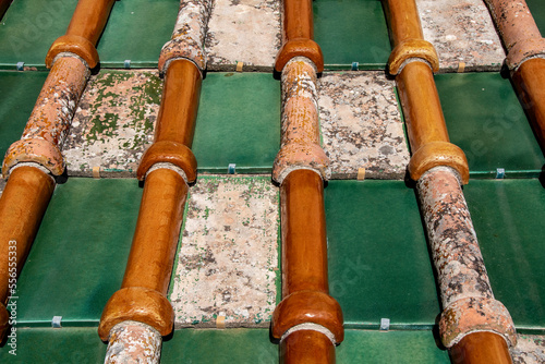 Multicolored tiles on the roof of the cathedral of Monreale photo