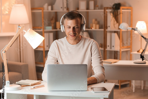 Young man with headphones a...