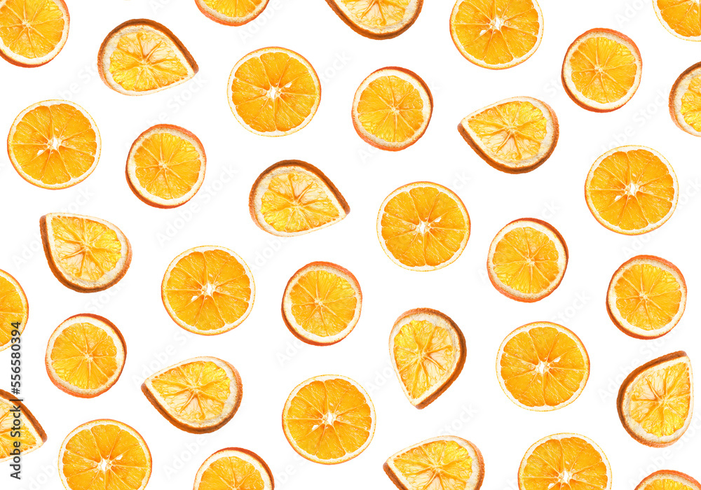 Many dry orange slices falling on white background Many dry orange slices falling on white background