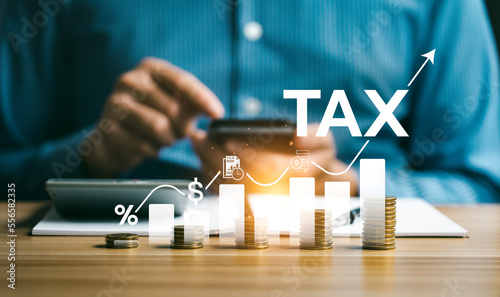 Bild auf Leinwand Tax payment and tax deduction planning involve strategies to minimize tax liability