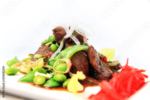Beef with Snow Pea Stir Fry - China Sichuan Food, white background