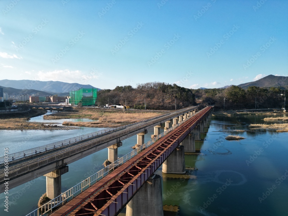Rail Road on sunny day with Mountain and river background, Gyeongju, South Korea