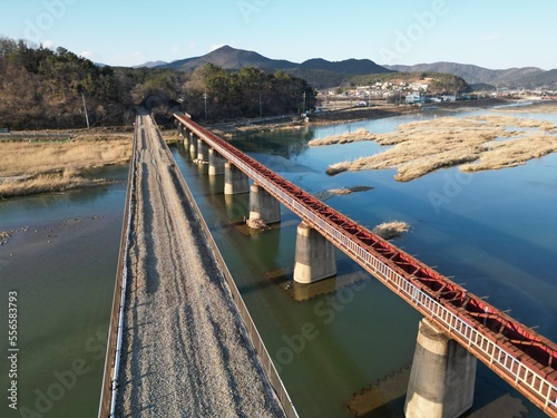 Photography Rail Road on sunny day with Mountain and river background, Gyeongju, South Korea
