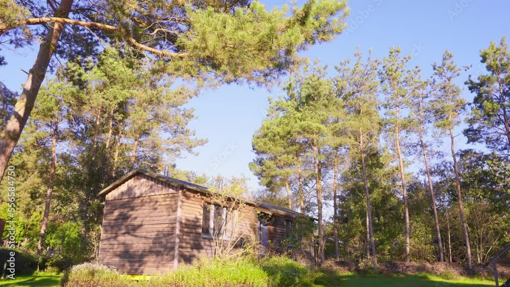 Establisher pan of Sieben Linden Ecovillage house in Germany, peaceful sunny day Establisher pan of Sieben Linden Ecovillage house in Germany, peaceful sunny day