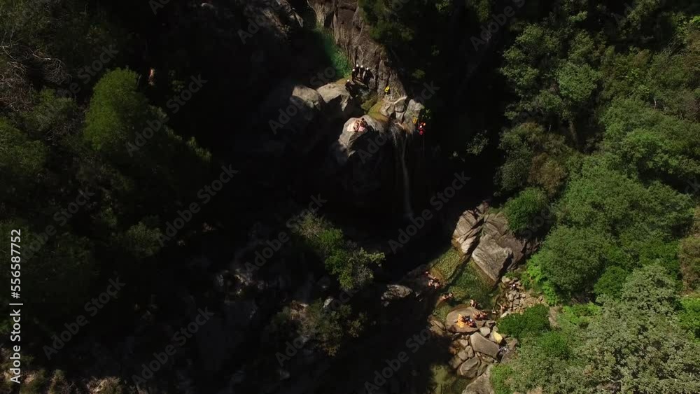 Top View of Extreme Sports on Mountain Waterfall Top View of Extreme Sports on Mountain Waterfall