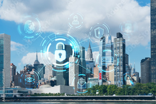 New York City skyline  United Nation headquarters over the East River  Manhattan  Midtown at day time  NYC  USA. The concept of cyber security to protect confidential information  padlock hologram
