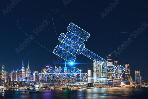 New York City skyline from New Jersey over the Hudson River with Hudson Yards at night. Manhattan  Midtown. Glowing hologram legal icons. The concept of law  order  regulations and digital justice