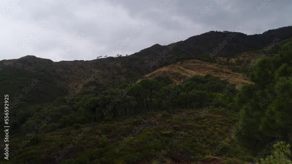 Rolling clouds above forestry mountain landscape of Spain, time lapse Rolling clouds above forestry mountain landscape of Spain, time lapse