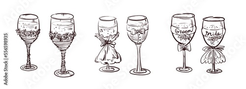A set of wedding glasses for the bride and groom. Hand-drawn drink glasses. Wedding glasses.