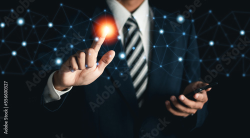 Businessman touching global network and wireless connection on virtual interface. Concept of information exchange.