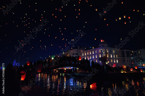 Many lanterns floating in the sky during the Volos Lantern Festival, Greece