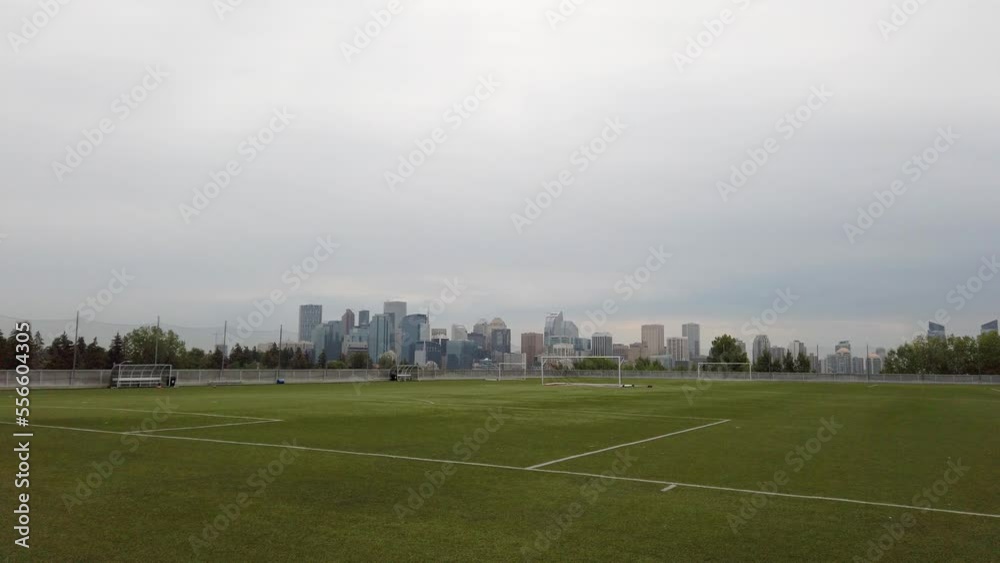 Soccer field with City skyline pan Calgary Alberta Canada Soccer field with City skyline pan Calgary Alberta Canada
