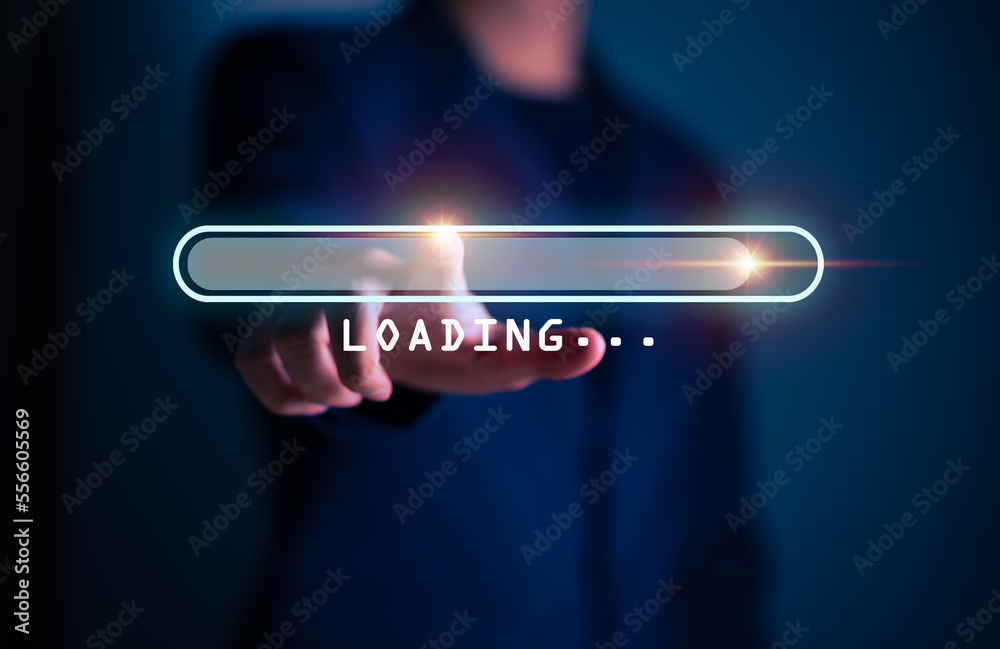 Businessman hand touching and pointing on loading bar year 2023 with virtual screen from 2022 to 2023, Businessman plan and increase of positive indicators in his business, Growing up business concept Businessman hand touching and pointing on loading bar year 2023 with virtual screen from 2022 to 2023, Businessman plan and increase of positive indicators in his business, Growing up business concept