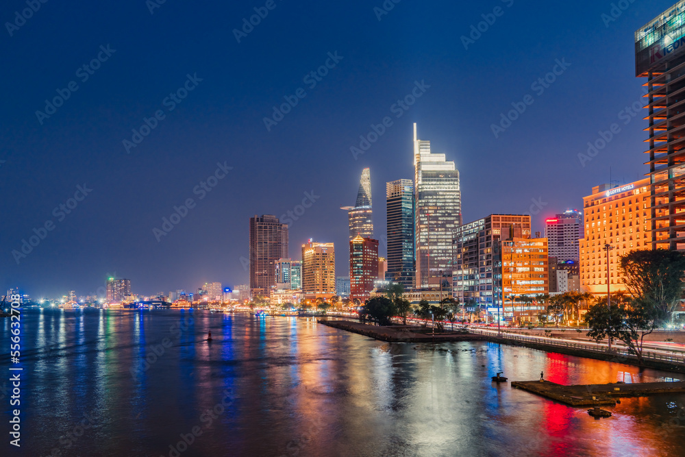 Ho Chi Minh City, Vietnam - December 26, 2022: Beautiful night in Ho Chi Minh city known as Saigon, one of the big cities is developed in Vietnam. See Bitexco tower, saigon river and center city view 