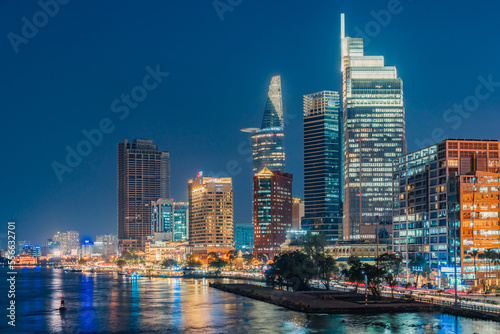 Ho Chi Minh City, Vietnam - December 26, 2022: Beautiful night in Ho Chi Minh city known as Saigon, one of the big cities is developed in Vietnam. See Bitexco tower, saigon river and center city view 