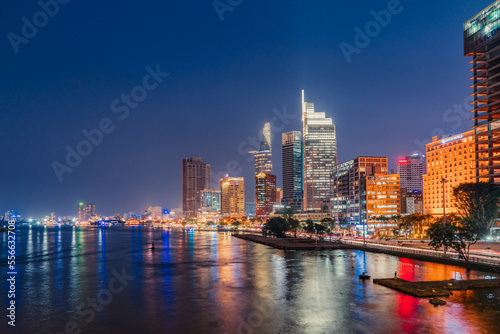 Ho Chi Minh City  Vietnam - December 26  2022  Beautiful night in Ho Chi Minh city known as Saigon  one of the big cities is developed in Vietnam. See Bitexco tower  saigon river and center city view 