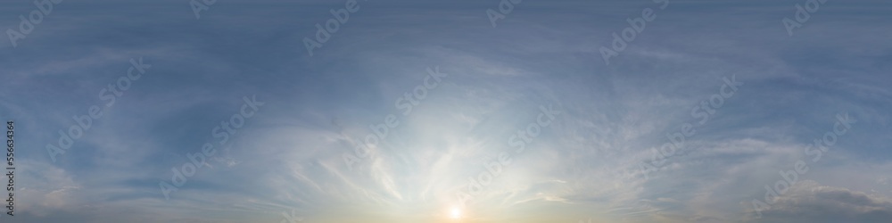 Dark blue sunset sky panorama with golden Cirrus clouds. Seamles