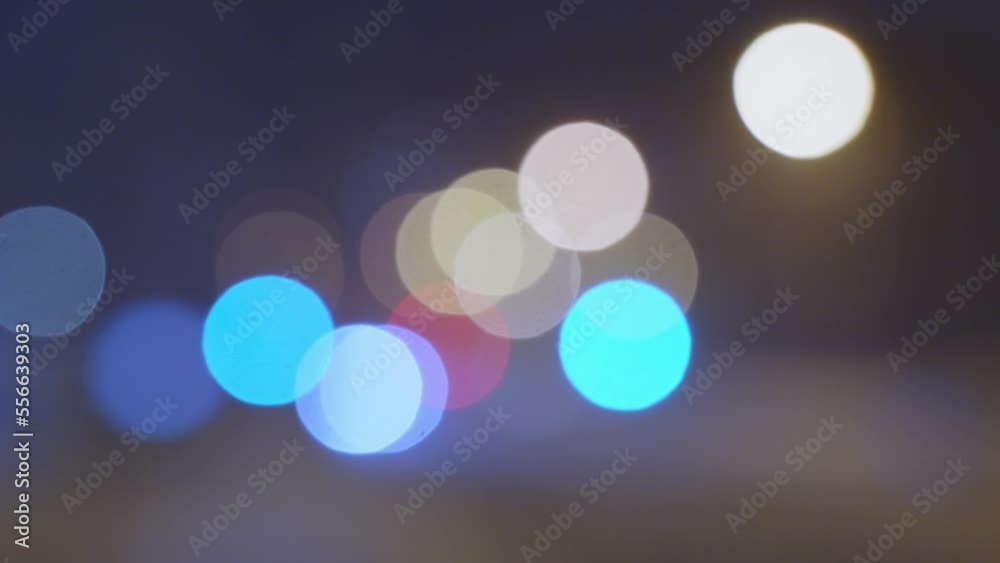 Blurred bokeh of cars and traffic lights on the road at night, abstract colorful Blurred bokeh of cars and traffic lights on the road at night, abstract colorful