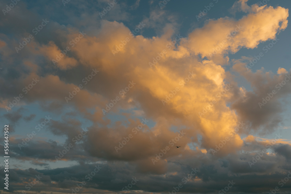 Dramatic fiery clouds at sunset, glowing in vibrant orange. Ceuta, Spain Dramatic fiery clouds at sunset, glowing in vibrant orange. Ceuta, Spain