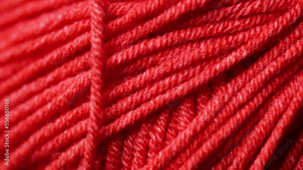 a tangle with woolen threads rotates in a circle