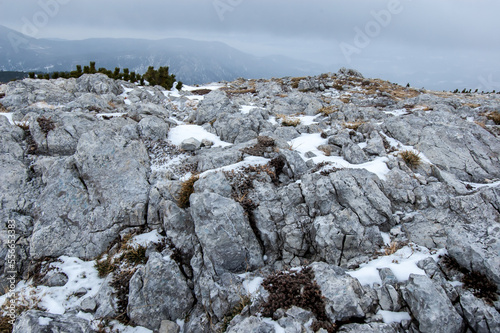 Stones in the snow. Rax, Alps, Lower Austria, Austria photo