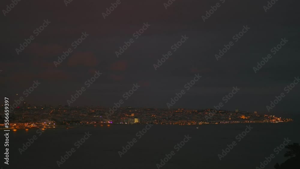 Timelapse of Lisbon when darkness is falling