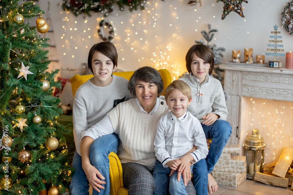 Christmas family picture in cozy home with lights and decoration