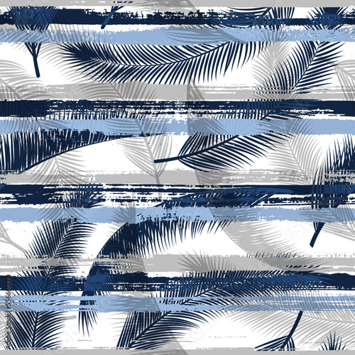 Cool coconut palm leaves tree branches over