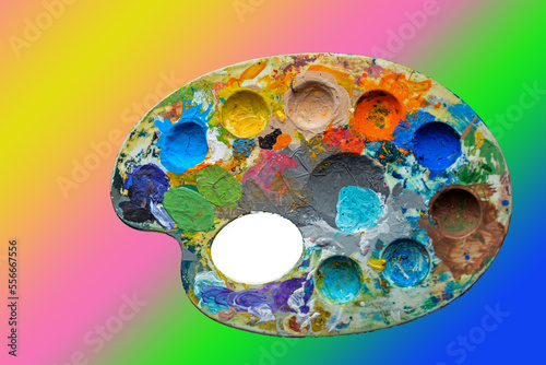 top view of palette with colorful paints isolated on grey