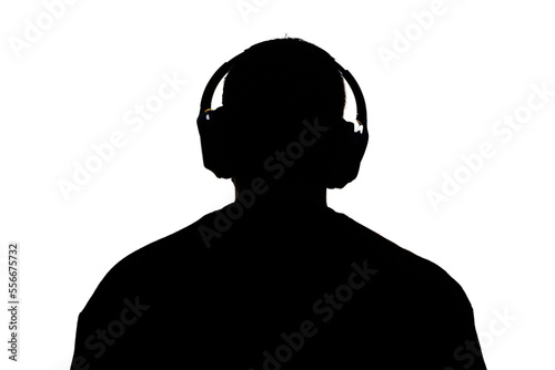 Silhouette of a man listening to music with headphones on a transparent background.