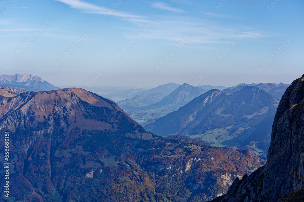 Scenic view from top of Axalp over Bernese Oberland with beautiful mountain panorama of the Swiss Alps on a sunny autumn day. Photo taken October 18th, 2022, Axalp, Switzerland.