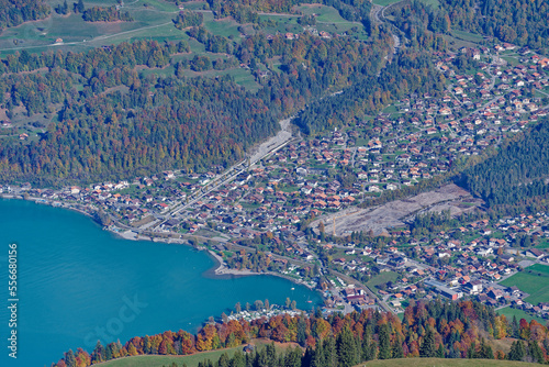 Beautiful aerial view over Lake Brienz with mountain village Schwanden autumn landscape seen from top of Axalp, Canton Bern, on a sunny day. Photo taken October 18th, 2022, Axalp, Switzerland.