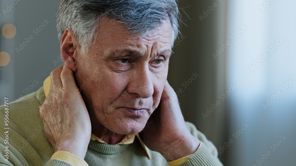 Sad old caucasian man suffer from neck pain 60s upset male tired grandfather feel ache in spine hurt discomfort tension rubbing muscle from uncomfortable posture osteochondrosis retired symptoms Sad old caucasian man suffer from neck pain 60s upset male tired grandfather feel ache in spine hurt discomfort tension rubbing muscle from uncomfortable posture osteochondrosis retired symptoms