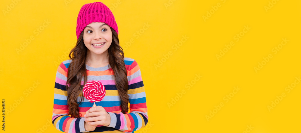 happy kid girl hold lollipop sweet, happiness. Teenager child with sweets, poster banner header, copy space. happy kid girl hold lollipop sweet, happiness. Teenager child with sweets, poster banner header, copy space.