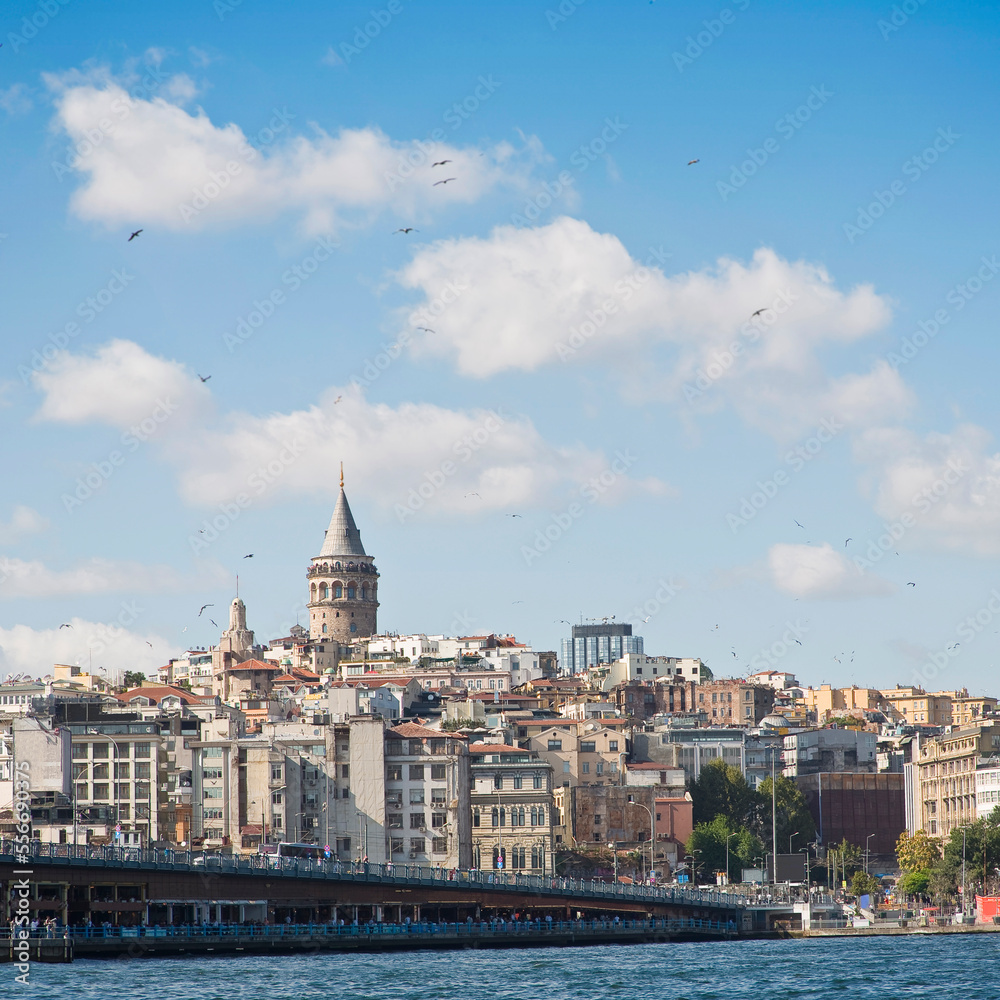 View of the famous fourteenth-century Galata Tower and Galata Bridge from the Bosphorus Strait - Istanbul - Turkey