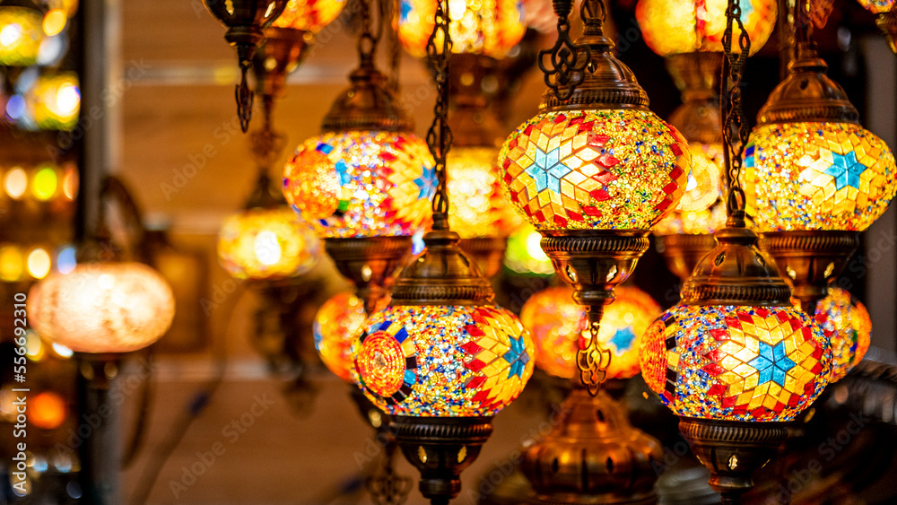 Lighting products sold in Istanbul Grand Bazaar, traditional Turkish lamps, touristic gifts, blurred background with spaces and text space		