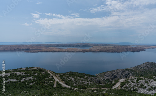 Beautiful Landscape ant Nature. Croatia Mountains with Sea and Road in Background. Cloudy Blue Sky