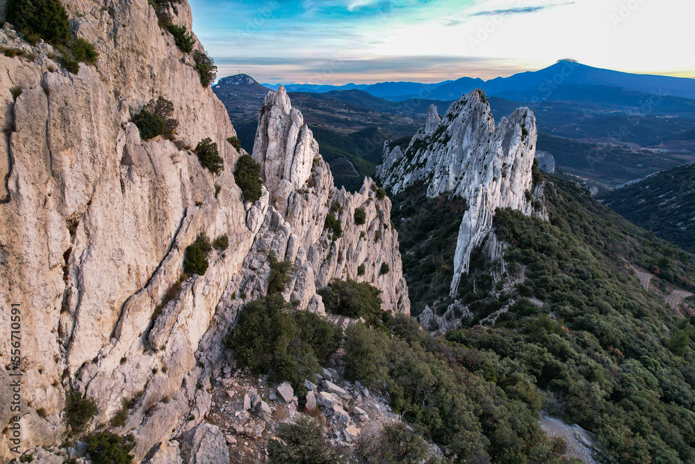 Aerial view of les Dentelles de Montmirail in front of the Mont Ventoux in the french alps