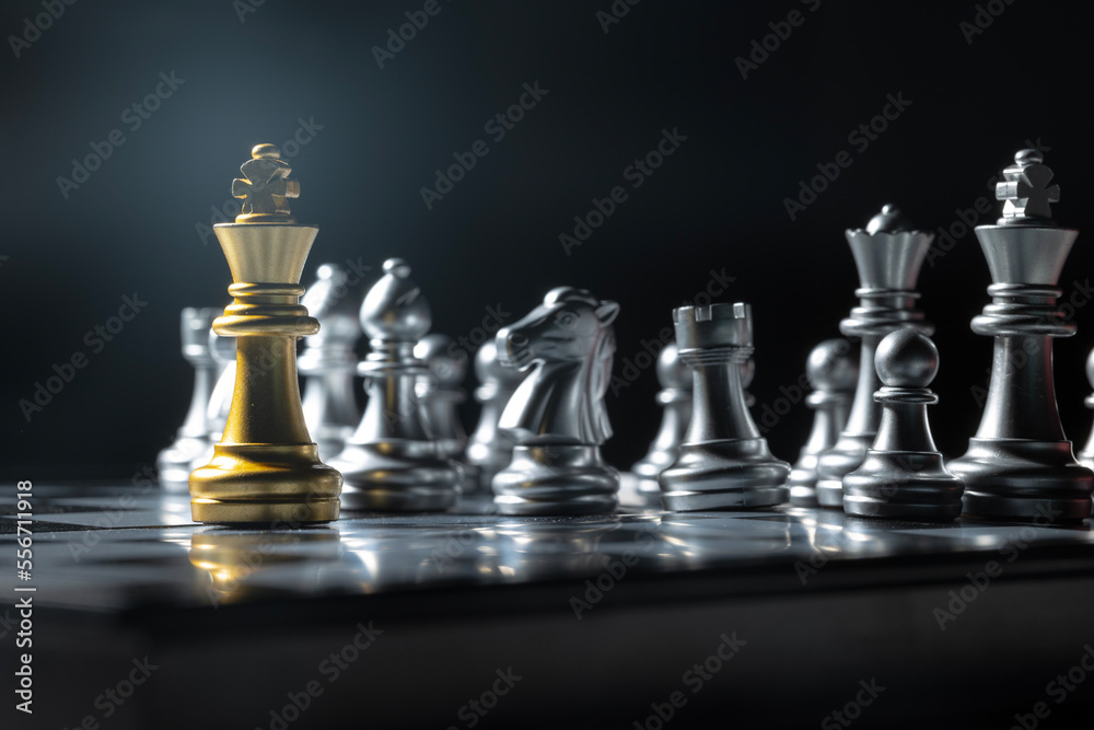 The chess king on the board is fighting with the opponent. business concept success concept The chess king on the board is fighting with the opponent. business concept success concept