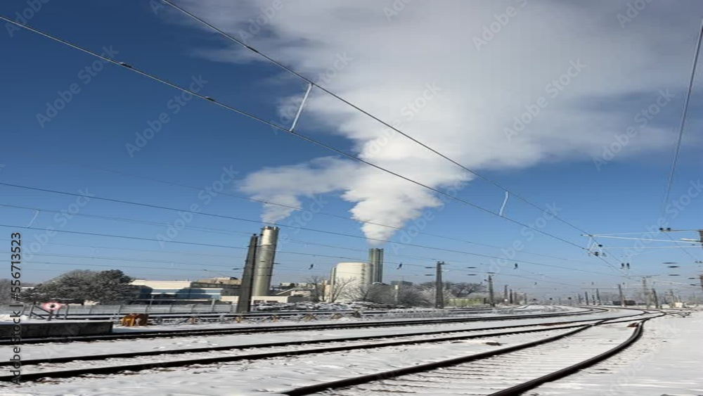 district heating plant and railroad tracks in winter district heating plant and railroad tracks in winter